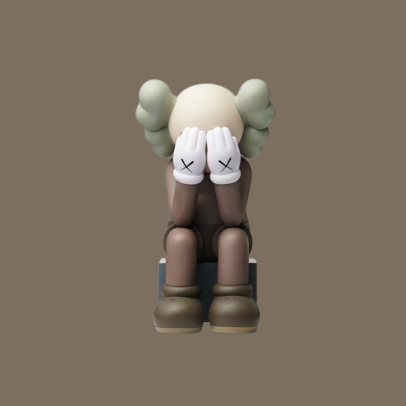 7d7712c89ac4246d6e3e4fe6e0177ead kaws passing through brown marron figurine paris.png