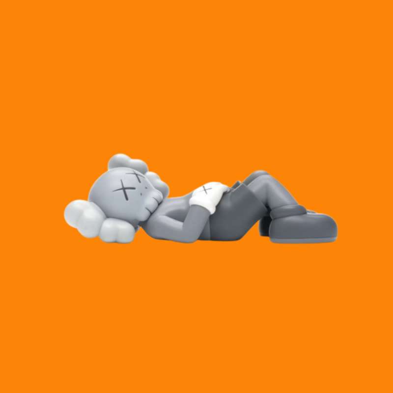 kaws holiday japan grey 1021 673caf3e180ba.png